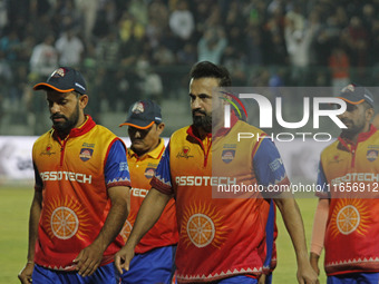 Skipper Irfan Pathan (C) of Konark Suryas Odisha is pictured with teammates during the Legends League Cricket T20 match between Gujarat Grea...