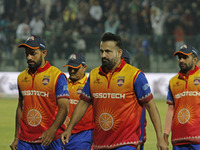 Skipper Irfan Pathan (C) of Konark Suryas Odisha is pictured with teammates during the Legends League Cricket T20 match between Gujarat Grea...