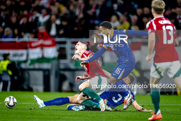 Hungary forward Roland Sallai, Netherlands midfielder Quinten Timber, and Netherlands defender Mickey van de Ven are present during the matc...