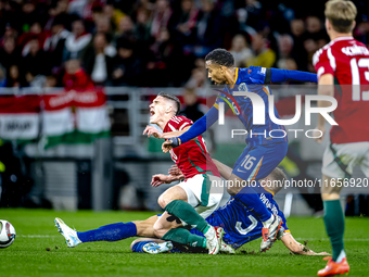 Hungary forward Roland Sallai, Netherlands midfielder Quinten Timber, and Netherlands defender Mickey van de Ven are present during the matc...