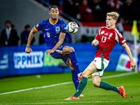 Netherlands midfielder Ryan Gravenberch and Hungary midfielder Andras Schafer play during the match between Hungary and the Netherlands at t...