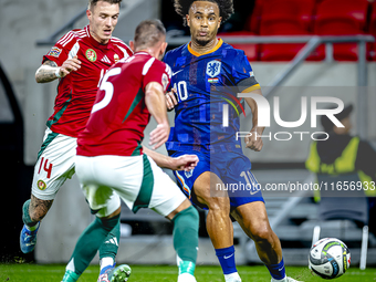 Netherlands midfielder Guus Til plays during the match between Hungary and the Netherlands at the Puskas Arena for the UEFA Nations League s...