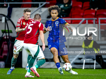 Netherlands midfielder Guus Til plays during the match between Hungary and the Netherlands at the Puskas Arena for the UEFA Nations League s...