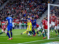 Scimmige scores a goal against Hungary goalkeeper Denes Dibusz during the match between Hungary and the Netherlands at the Puskas Arena for...