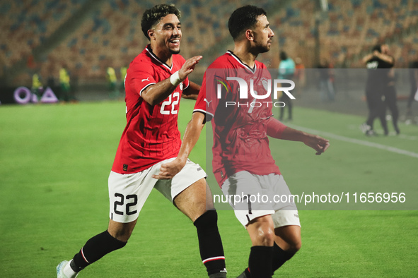 Omar Marmoush and Trezeguet, players of the Egyptian national team, celebrate the goal during the match between Egypt and Mauritania in the...