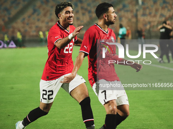 Omar Marmoush and Trezeguet, players of the Egyptian national team, celebrate the goal during the match between Egypt and Mauritania in the...