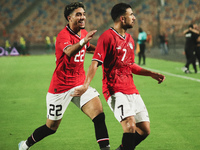 Omar Marmoush and Trezeguet, players of the Egyptian national team, celebrate the goal during the match between Egypt and Mauritania in the...