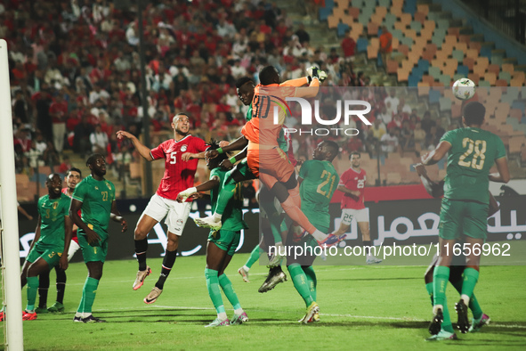 The Mauritania goalkeeper saves the ball during the match between Egypt and Mauritania in the African Cup of Nations qualifiers in Cairo, Eg...