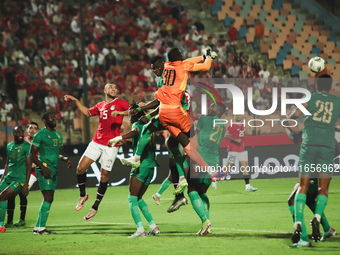 The Mauritania goalkeeper saves the ball during the match between Egypt and Mauritania in the African Cup of Nations qualifiers in Cairo, Eg...