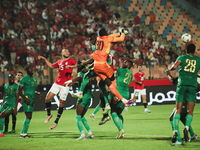 The Mauritania goalkeeper saves the ball during the match between Egypt and Mauritania in the African Cup of Nations qualifiers in Cairo, Eg...