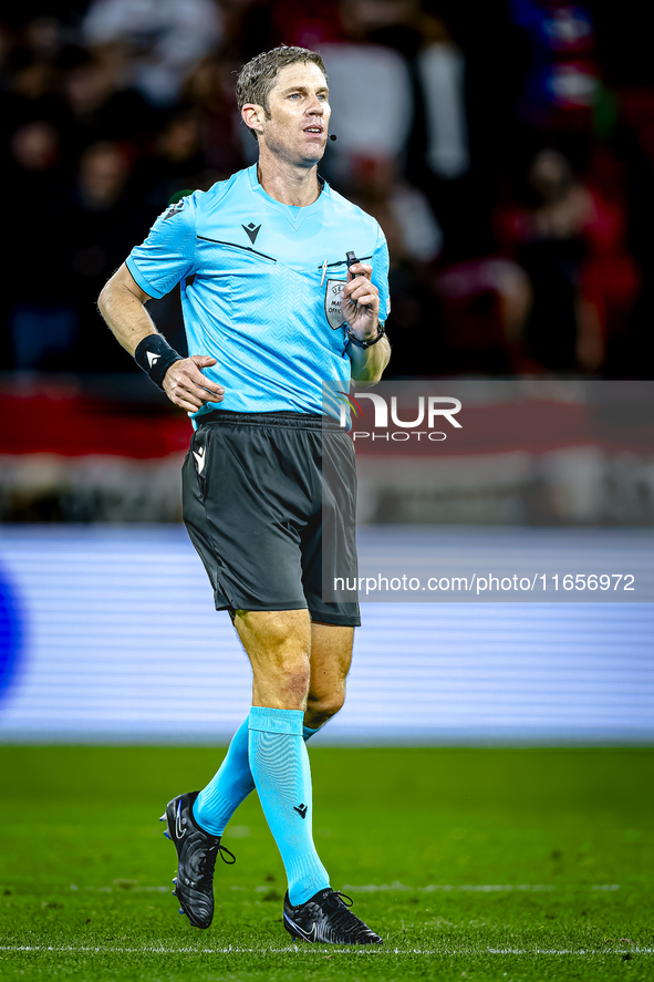 Referee Lukas Fahndrich officiates the match between Hungary and the Netherlands at the Puskas Arena for the UEFA Nations League season 2024...