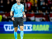 Referee Lukas Fahndrich officiates the match between Hungary and the Netherlands at the Puskas Arena for the UEFA Nations League season 2024...