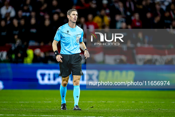 Referee Lukas Fahndrich officiates the match between Hungary and the Netherlands at the Puskas Arena for the UEFA Nations League season 2024...