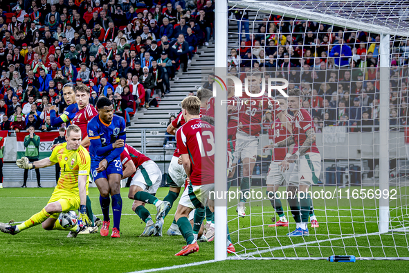 Hungary goalkeeper Denes Dibusz plays during the match between Hungary and the Netherlands at the Puskas Arena for the UEFA Nations League s...