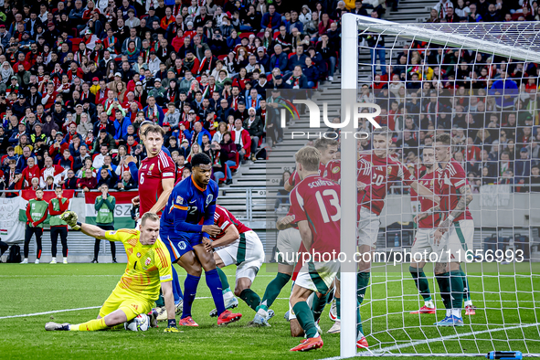 Hungary goalkeeper Denes Dibusz plays during the match between Hungary and the Netherlands at the Puskas Arena for the UEFA Nations League s...