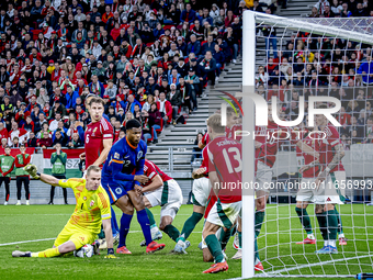 Hungary goalkeeper Denes Dibusz plays during the match between Hungary and the Netherlands at the Puskas Arena for the UEFA Nations League s...