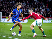 Netherlands forward Joshua Zirkzee and Hungary defender Marton Dardai play during the match between Hungary and the Netherlands at the Puska...