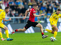 Ivan Kaliuzhnyi, Giorgi Chakvetadze, Georgiy Sudakov are playing during the  UEFA Nations League 2024 League B Group B1 match between Ukrain...