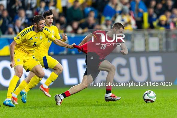 Ivan Kaliuzhnyi, Giorgi Chakvetadze are playing during the  UEFA Nations League 2024 League B Group B1 match between Ukraine and Georgia , a...