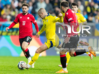 Otar Kiteishvili, Mykhailo Mudryk are playing during the  UEFA Nations League 2024 League B Group B1 match between Ukraine and Georgia , at...