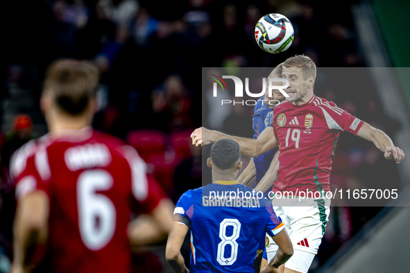 Netherlands defender Stefan de Vrij and Hungary forward Barnabas Varga are present during the match between Hungary and the Netherlands at t...