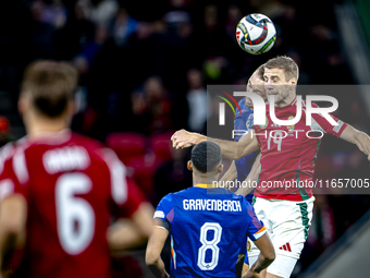 Netherlands defender Stefan de Vrij and Hungary forward Barnabas Varga are present during the match between Hungary and the Netherlands at t...