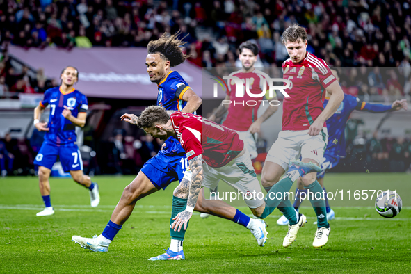 Netherlands forward Joshua Zirkzee and Hungary forward Barnabas Varga play during the match between Hungary and the Netherlands at the Puska...