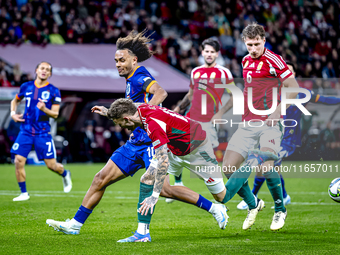 Netherlands forward Joshua Zirkzee and Hungary forward Barnabas Varga play during the match between Hungary and the Netherlands at the Puska...