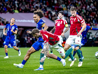 Netherlands forward Joshua Zirkzee and Hungary forward Barnabas Varga play during the match between Hungary and the Netherlands at the Puska...