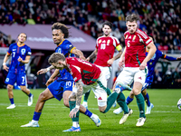 Netherlands forward Joshua Zirkzee and Hungary forward Barnabas Varga play during the match between Hungary and the Netherlands at the Puska...