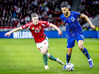 Hungary forward Roland Sallai and Netherlands forward Cody Gakpo participate in the match between Hungary and the Netherlands at the Puskas...