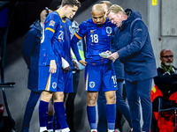 Netherlands trainer Ronald Koeman and Netherlands forward Donyell Malen are present during the match between Hungary and the Netherlands at...