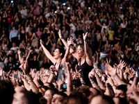 More than 45,000 people attend the concert to raise funds for legal expenses related to the case of the Tempe incident and in memory of the...