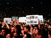 More than 45,000 people attend the concert to raise funds for legal expenses related to the case of the Tempe incident and in memory of the...