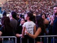 More than 45,000 people attend the concert to raise funds for legal expenses related to the case of the Tempe incident and in memory of the...