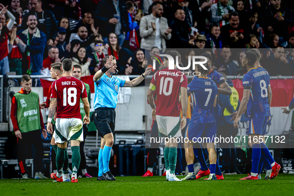 Netherlands defender Virgil van Dijk receives a red card during the match between Hungary and the Netherlands at the Puskas Arena for the UE...