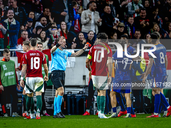 Netherlands defender Virgil van Dijk receives a red card during the match between Hungary and the Netherlands at the Puskas Arena for the UE...