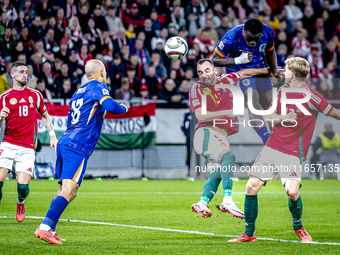 Hungary defender Attila Fiola and Netherlands forward Brian Brobbey play during the match between Hungary and the Netherlands at the Puskas...