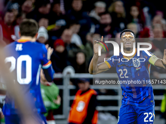 Netherlands defender Denzel Dumfries scores to make it 1-1 and celebrates the goal during the match between Hungary and the Netherlands at t...