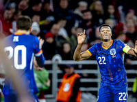 Netherlands defender Denzel Dumfries scores to make it 1-1 and celebrates the goal during the match between Hungary and the Netherlands at t...