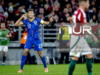 Netherlands defender Denzel Dumfries scores to make it 1-1 and celebrates the goal during the match between Hungary and the Netherlands at t...