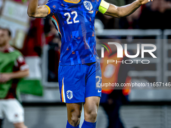 Netherlands defender Denzel Dumfries scores to make it 1-1 and celebrates the goal during the match between Hungary and the Netherlands at t...