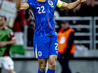 Netherlands defender Denzel Dumfries scores to make it 1-1 and celebrates the goal during the match between Hungary and the Netherlands at t...