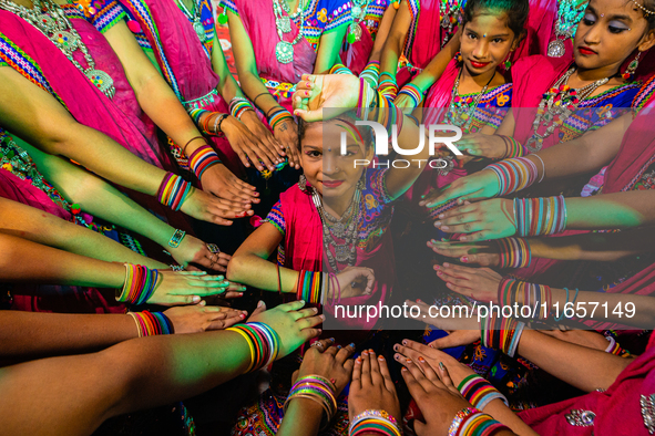 During Garbi organized by RA Garbi Mandal in Jamnagar, India, on Navratri, children worship Adhyashakti traditionally by performing the Raas...