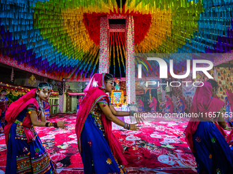 During Garbi organized by RA Garbi Mandal in Jamnagar, India, on Navratri, children worship Adhyashakti traditionally by performing the Raas...