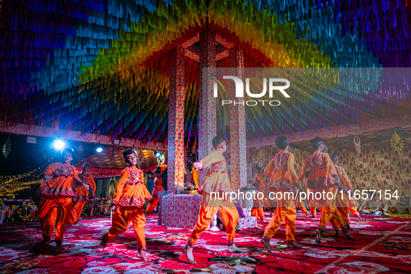 During Garbi organized by RA Garbi Mandal in Jamnagar, India, on Navratri, children worship Adhyashakti traditionally by performing the Raas...