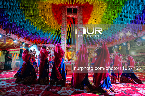 During Garbi organized by RA Garbi Mandal in Jamnagar, India, on Navratri, children worship Adhyashakti traditionally by performing the Raas...