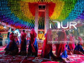 During Garbi organized by RA Garbi Mandal in Jamnagar, India, on Navratri, children worship Adhyashakti traditionally by performing the Raas...