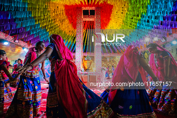 During Garbi organized by RA Garbi Mandal in Jamnagar, India, on Navratri, children worship Adhyashakti traditionally by performing the Raas...