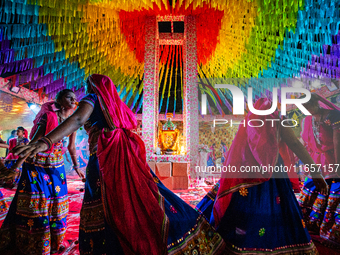 During Garbi organized by RA Garbi Mandal in Jamnagar, India, on Navratri, children worship Adhyashakti traditionally by performing the Raas...